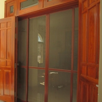 CỬA LƯỚI CHỐNG MUỖI LÙA VÂN GỖ 2 CÁNH