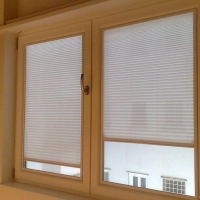 CỬA LƯỚI CHỐNG MUỖI TỰ CUỐN DỌC